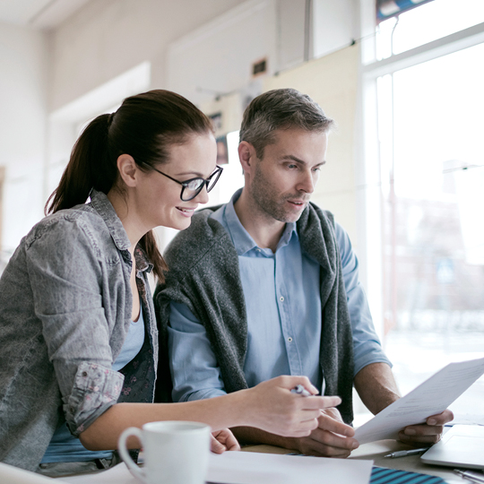 people looking into some papers