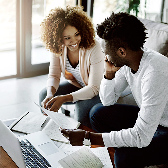 people discussing with tablets