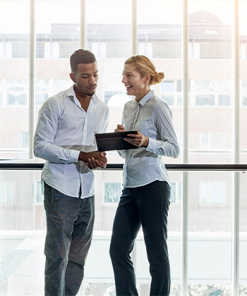 people discussing with tablet