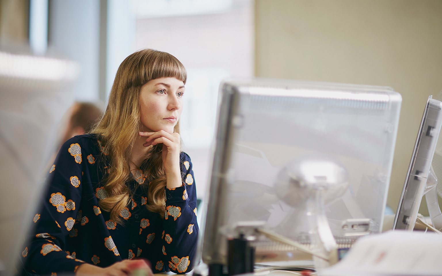 woman looking to the screen