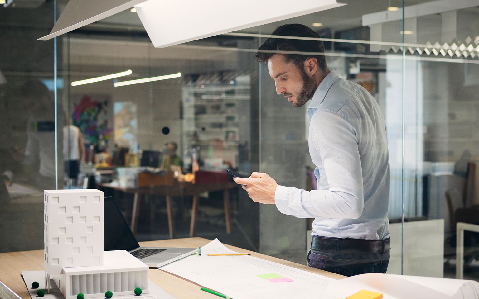 designer on the phone in an office