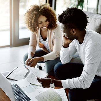 people discussing with tablets