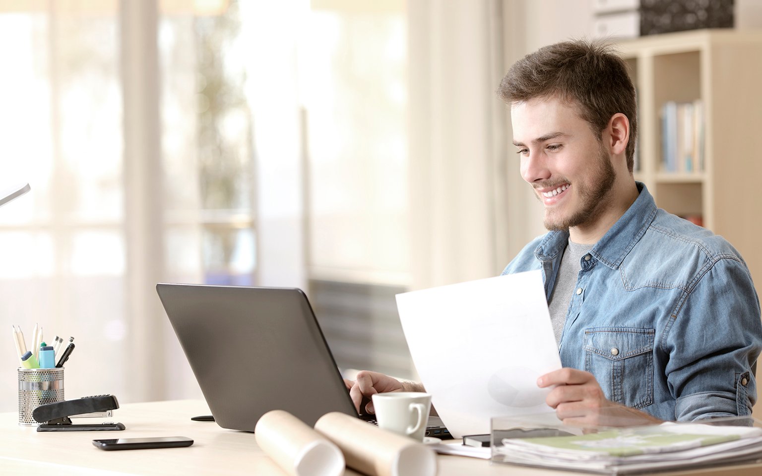 man working with a laptop